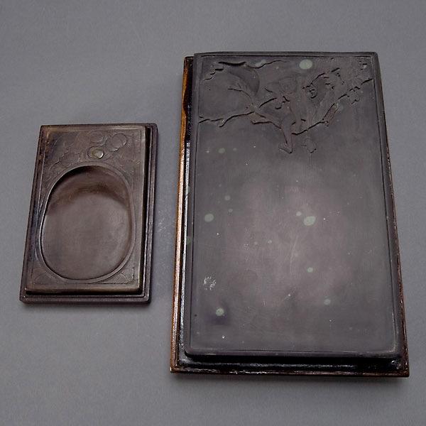 Two Inkstones with Matching Wood Boxes: Two Inkstones with Matching Wood Boxes, the smaller depicts a bird among pumpkins and leaves; the larger is carved with a monkey lounging in a tree {Largest box 3 1/2 x 8 1/2 x 13 1/2 inches}