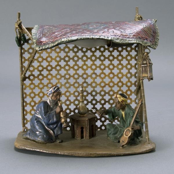 Vienna Cold Painted Bronze Lamp: Vienna Cold Painted Bronze Lamp in Middle Eastern Taste A carpet forming canopy for a single light and a hut for two Arab musicians, one playing a sitar, the other a horn, a reticulated clover pattern