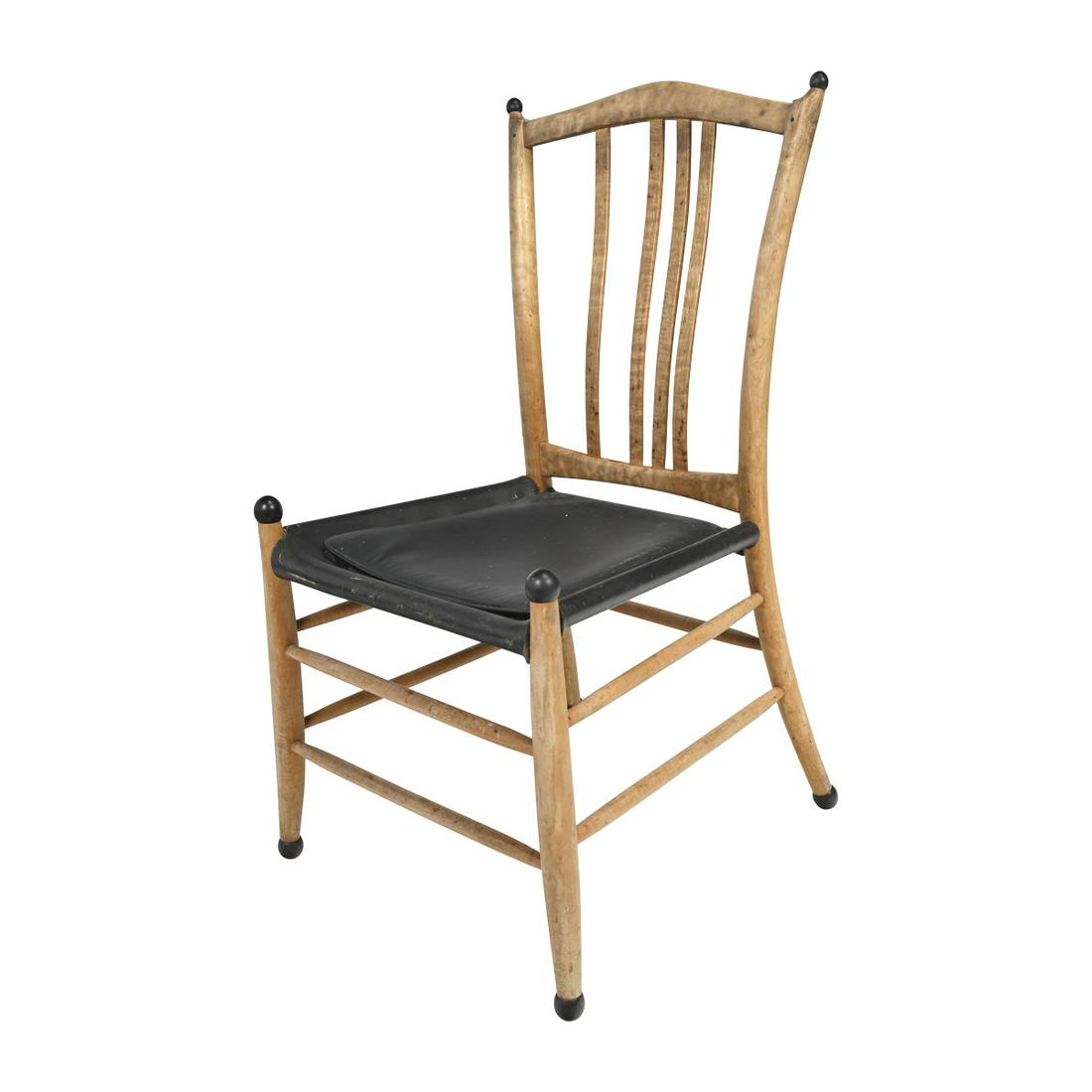 Robert Erickson Parcel Ebonized Maple Side Chair.: Robert Erickson Parcel Ebonized Maple Side Chair. The legs, geet, and head rail all with black balls, black leather seat with cushion. Stretcher rail inscribed with 'Robert Erickson 1990 47 Rb Nevada