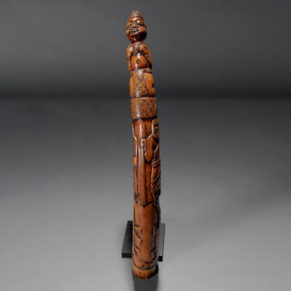 YORBA tribe (Nigeria) Horn trumpet,: YORUBA tribe (Nigeria) Trumpet, dark brown color, Surface carved with people and reptiles.