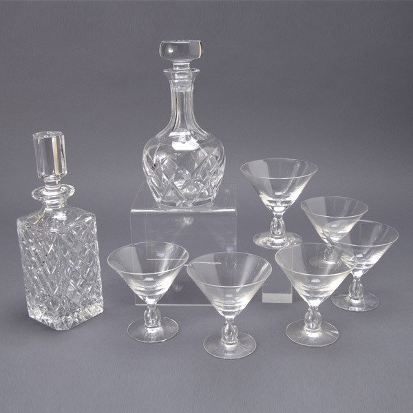 Six Steuben Martini Glasses and Two Decanters: Six Steuben Martini Glasses; together with two decanters (8) {Height of glasses 4 1/4 inches; height of taller decanter 10 3/4 inches} [Two glasses with rim chips]