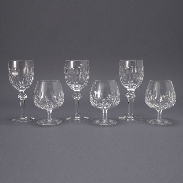 Assembled Waterford Crystal Suite (12): Assembled Waterford Crystal Suite: set of six wine glasses (height 7 1/2 inches); and set of six snifters (height 5 1/4 inches, one with chip on base) (12)