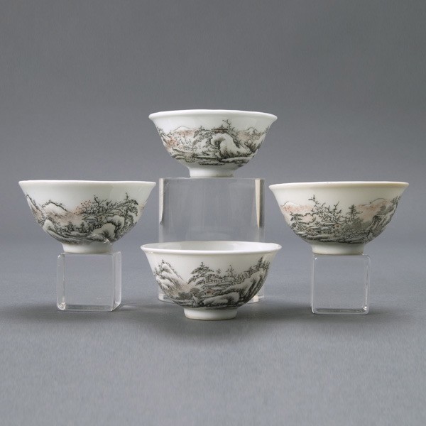 Four Small Grisaille Enameled Porcelain Cups: Four Small Faux-Bois Grisaille Enamel Porcelain Cups, each depicts a mountainous snowy winter landscape scene with buildings, a four character seal "Xu Ren Chu Pin" on each base {Each diameter 2 1/4 i