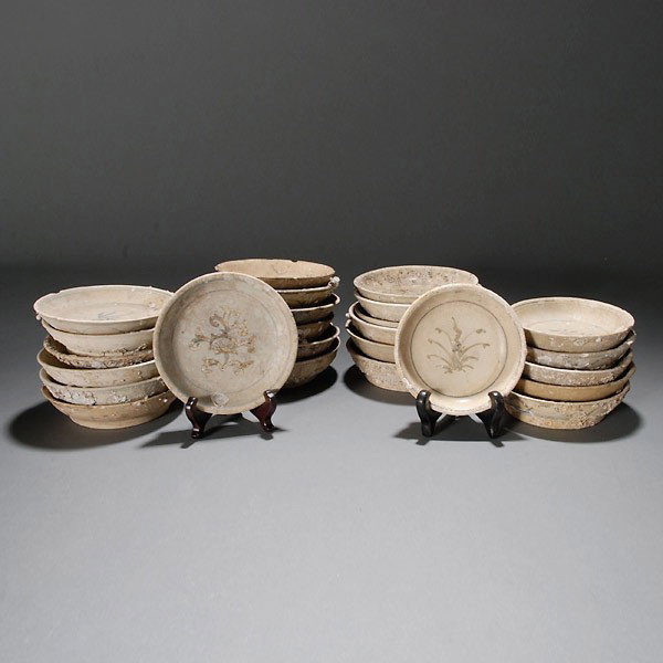 25 Hoi An Hoard B/W Various Vietnamese Saucers: Twenty-five Hoi An Hoard Bue and White Various Vietnamese Floral Motif Saucers,Late 15th/Early 16th Century {Average diameter 5 1/4 inches} [Marine encrustation on most]