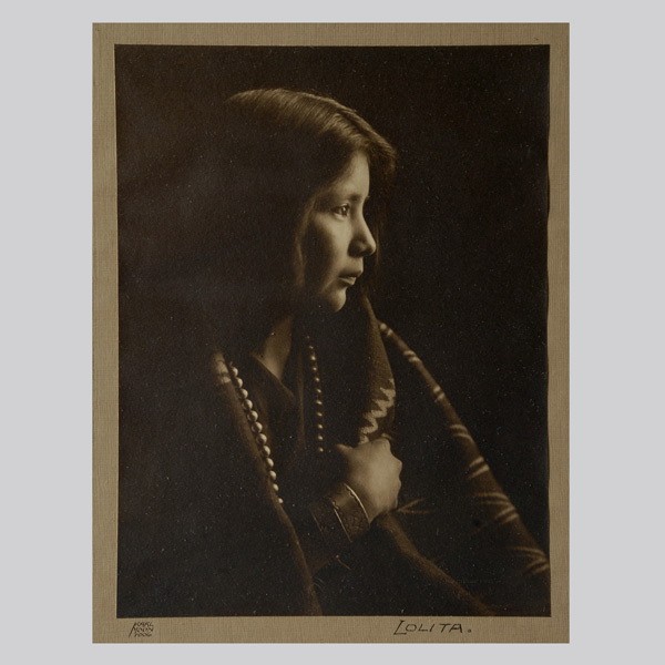CARL EVERTON MOON, Sepia photo "Lolita" 1908: CARL EVERTON MOON (American, 1879-1948). Sepia toned photo "Lolita"; with Fred Harvey stamp 1908. Sight: 10 x 7 inches. Good condition. Framed, matted, and glazed.