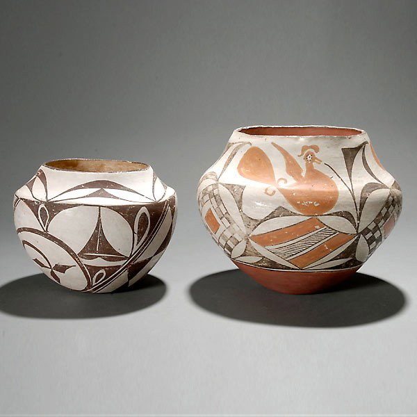 Acoma polycrome pottery jar scirca 1930 and anothe: Two Native American pottery jars. Acoma polycrome pottery jar circa 1930; the other from Oaxaca Mexico. Larger H = 7 inches.