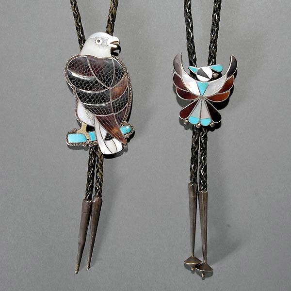 2 ZUNI Turquoise & pearl inlaid Silver Bolo: Two ZUNI or NAVAJO Turquoise and mother of pearl inlaid Silver Bolo ties, One in the shape of a bird. 2 x 1 1/2 inches. Other in the shape of Bald Eagle. 3 1/2 x 2 3/4 inches. Very good condition