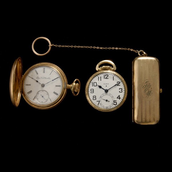 THREE GOLD FILLED ITEMS: COLLECTION OF THREE GOLD FILLED ITEMS. Including one gold filled, metal coin holder, measuring approximately 77.00 x 31.00 x 13.00 mm, with gold filled chain and ring; one Elgin gold filled open face 