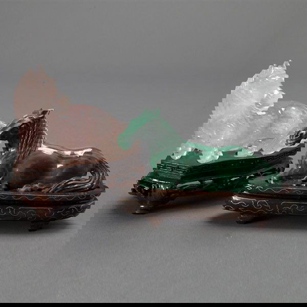 Two Carved Recumbent Horses: Two Carved Recumbent Horses, one executed from rose quartz, the other from malachite; both with matching wood stands {Longest 3 1/2 inches}