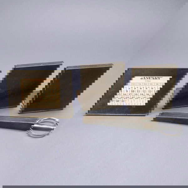 Silvercrest Bronze Four Piece Desk Set: Silvercrest Bronze Desk Set, including a Pair of Bookends #308-55, a Calendar #3A-55, and a pair of Scissors in Case (4) {Dimensions of calendar 5 x 6 1/2 inches} [Scissors case lacking letter opener]