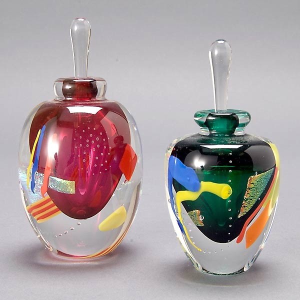 Two Donald Carlson Art Glass Encased Scent Bottles: Two Donald Carlson Art Glass Encased Scent Bottles with Stoppers, signed and numbered on base: #7094; #7096 {Height of taller 6 inches}