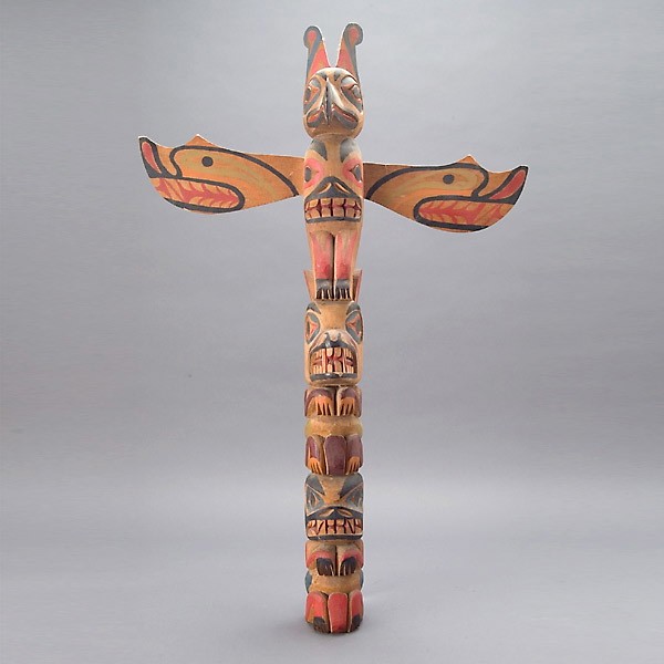 North West Coast Totem. L=37 inches.: North West Coast Totem. Height =37 inches. With label from Ye Old Curiosity shop Seattle Wa.