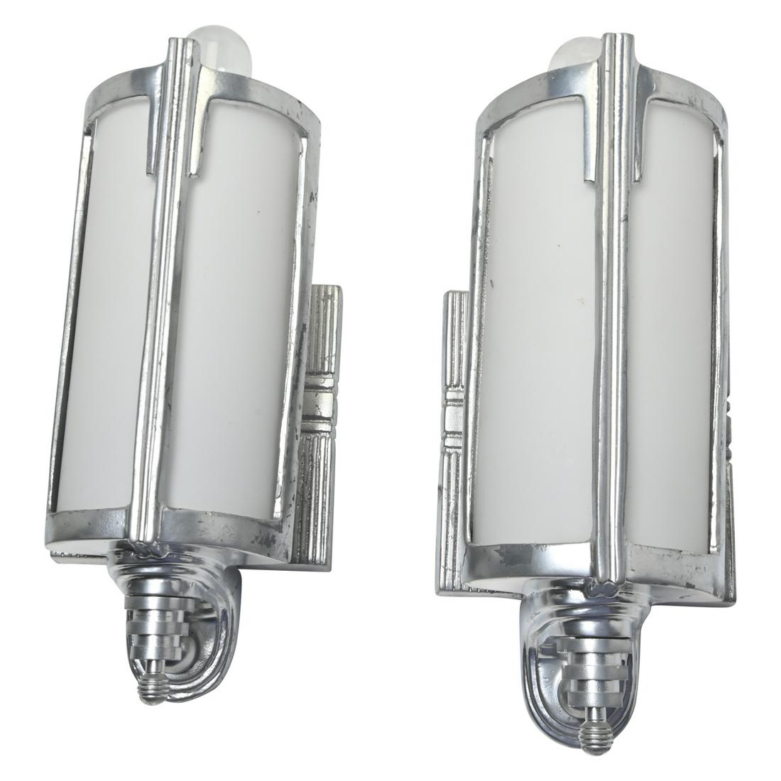 Pair of Art Deco Tubular Wall Lights.: Pair of Art Deco Nickel Plated and Glass Tubular Wall Lights. Opaque white glass panes, nickel plated bodies. {Approximate dimensions: 10 1/4 inches high with included bulbs.}. Condition: Minor patina