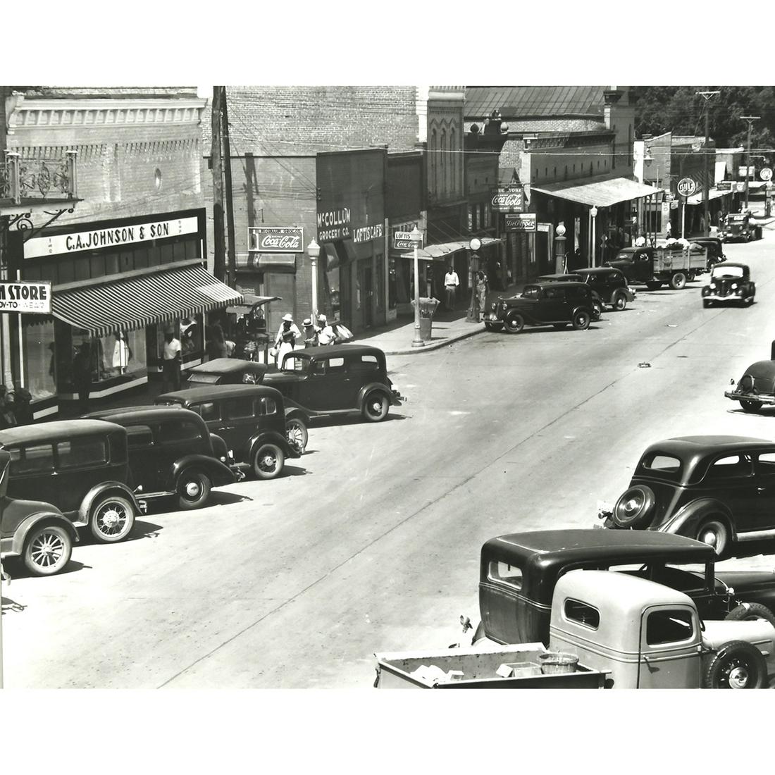 Walker Evans, ''Main Street'', gelatin silver print: WALKER EVANS (American, 1903-1975), ''Main Street of County Seat, Alabama'', 1936, gelatin silver print, image size: 10.25 x 12.75, overall (framed): 17 x 19.5 inches. later impression, stamped verso,