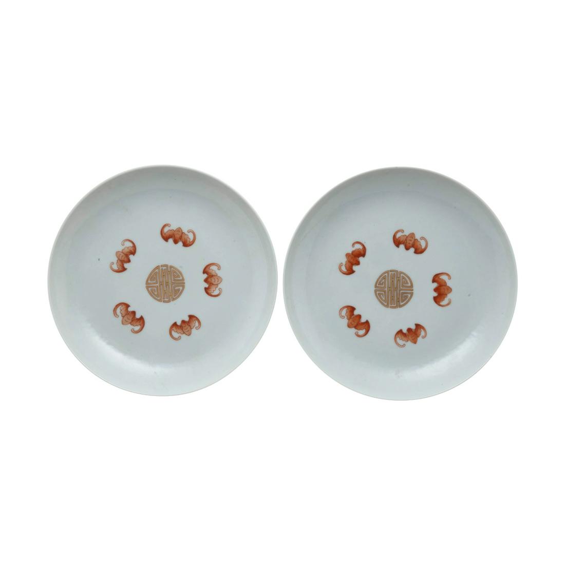 Pair of Chinese Famille Rose Porcelain Dishes: Pair of Chinese Famille Rose Porcelain Dishes. Each decorated interior with five iron-red bats encircling a gilt 'Shou' medallion, exterior painted in famille rose enamels four inscribed roundels divi