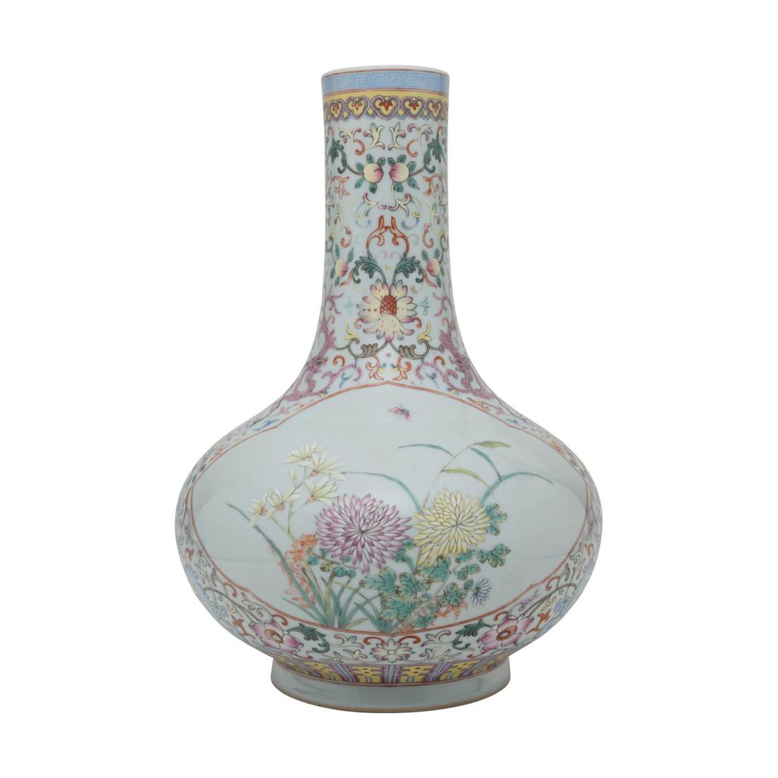 Chinese Famille Rose Floral and Dragon Bottle Vase: A Chinese Famille Rose Porcelain Floral and Dragon Bottle Vase, Qianlong mark. Of compressed globular form with a tall neck, supported by a tapered foot, the body decorated with continuous floral scro