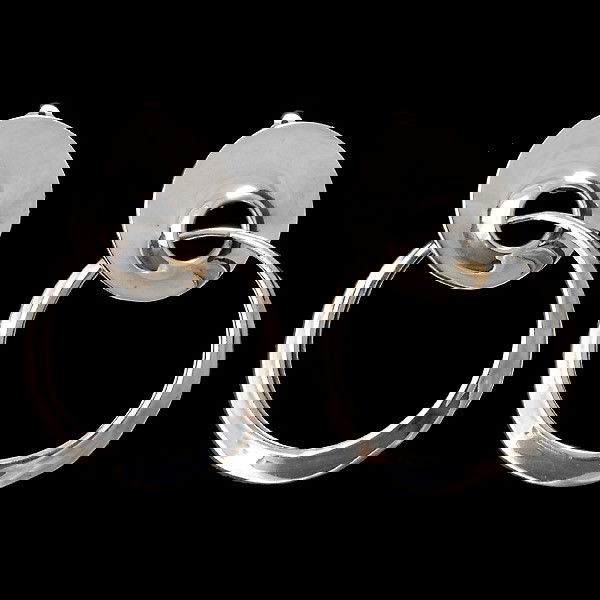 VINTAGE ROBERT LEE MORRIS SILVER HOOP EARRINGS: VINTAGE ROBERT LEE MORRIS SILVER HOOP EARRINGS. Featuring the crater and thin bubble hoop design, completed by a clip back. Circa early 1980's.