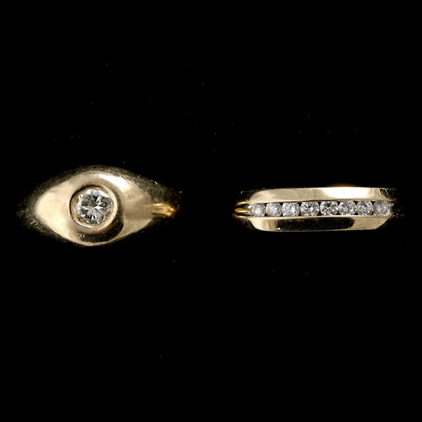 COLLECTION OF TWO DIAMOND, 14K YELLOW GOLD RINGS.: COLLECTION OF TWO DIAMOND, 14K YELLOW GOLD RINGS. Including one diamond, 14k yellow gold ring, featuring one diamond weighing approximately 0.25ct, flush set in a 14k yellow gold mounting; together wi