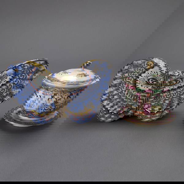 An Enameled Metal Butterfly Box & a Covered Tea Cu: An Export Canton Enameled Metal Butterfly Form Jewelry Box and a Rose Medallion Covered Tea Cup with Under Tray {Width of box 7 inches} [Discoloration to enamel]