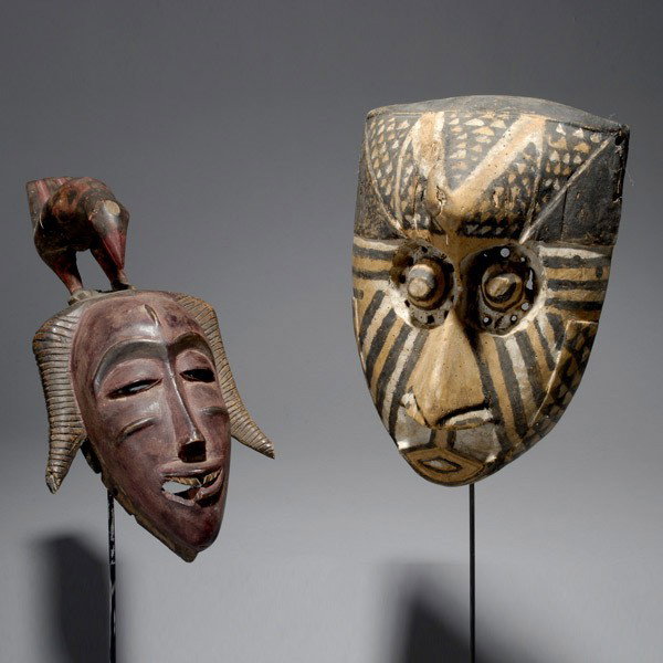 Two African masks ex Emerson Woelffer: TWO AFRICAN MASKS. H = 16 inches. Provenance: the estate of Emerson Woelffer, Los Angeles.