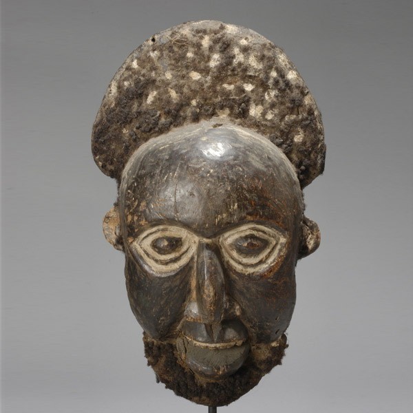 BAMILEKE mask on stand ex Emerson Woelffer: BAMILEKE mask on stand. H = 16 1/2 inches. Provenance: the estate of Emerson Woelffer, Los Angeles.