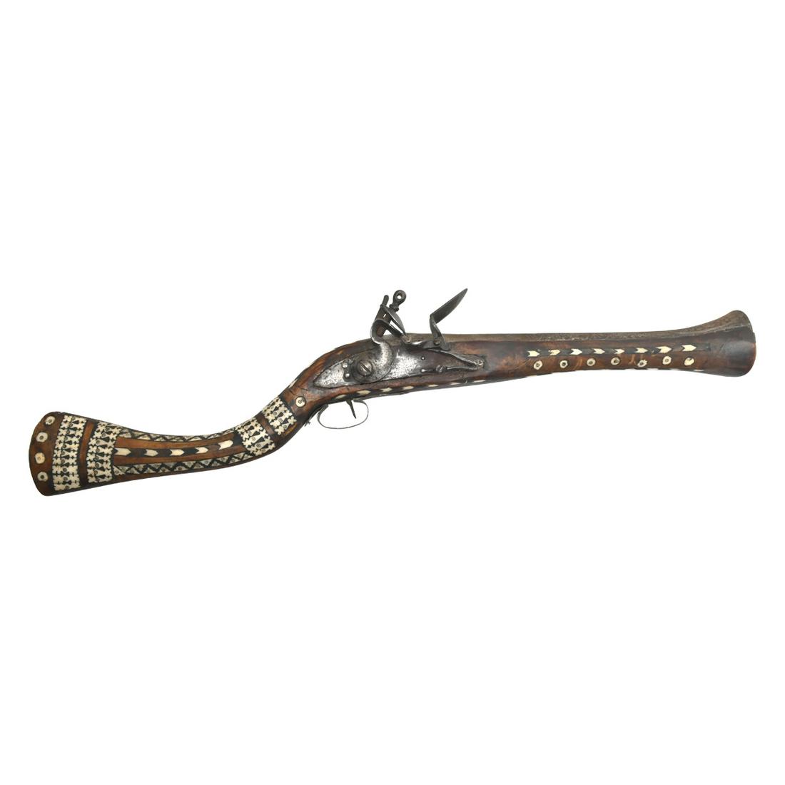 Persian Bone Inlaid Flintlock Blunderbuss.: Persian Bone Inlaid Flintlock Blunderbuss. With jezail type butt, bone and horn inlay to the wood body throughout, incised decoration to the barrel. 18th century. {Approximate dimensions: 29 1/4 inche