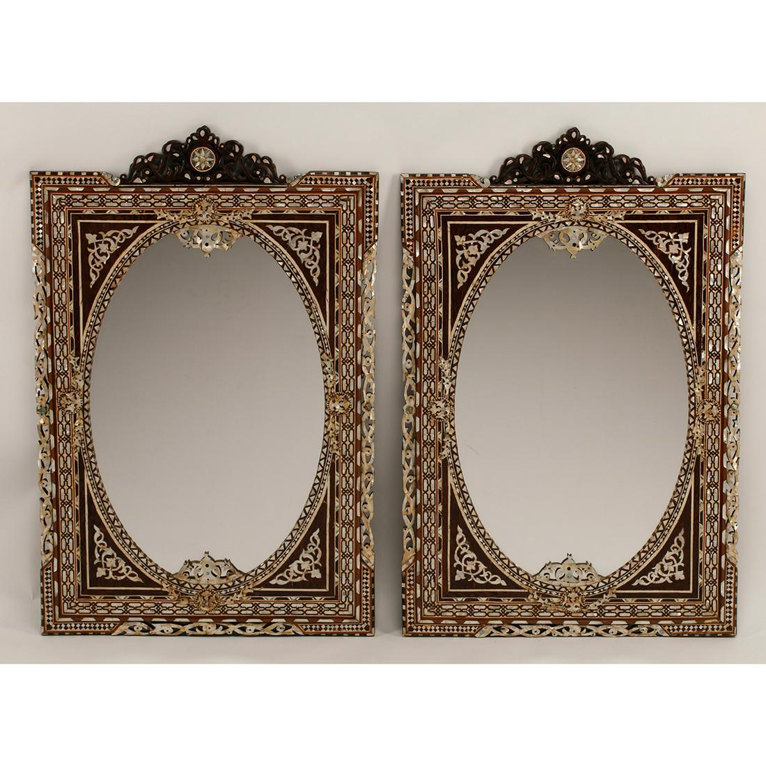 Pair of Moorish Style Inlaid Mirrors: Pair of Moorish Style Inlaid Mirrors. {Approximate dimensions: 47 1/2 high x 31 1/2 inches wide.}. Condition: Light surface wear, lose to inlay with some repair.