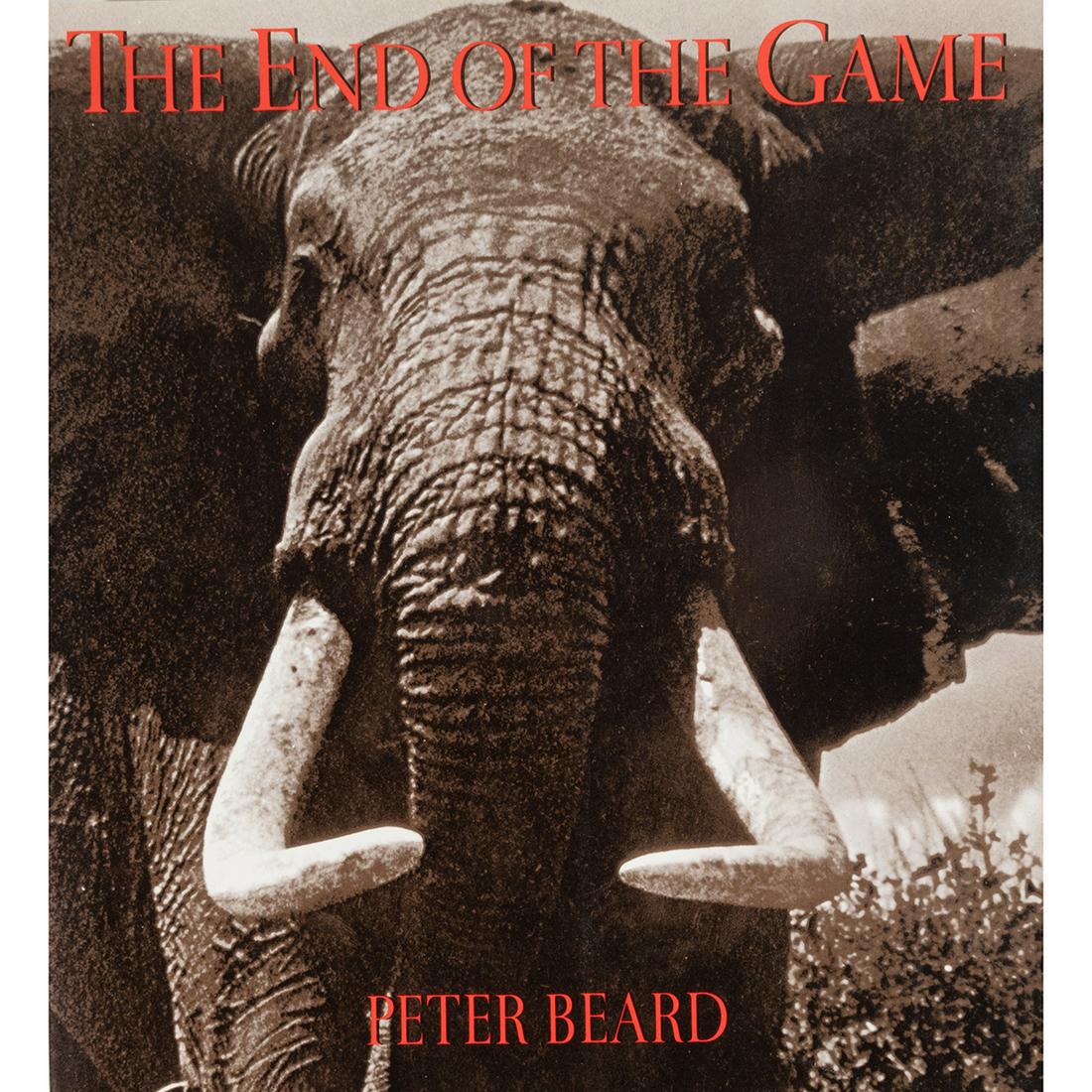 Peter Beard, The End of the Game, book signed by artist: PETER BEARD American, 1938-2020), "The End of the Game," 1988, book of photographs published by Chronicle Books, signed in red felt pen by Beard, book: 10.75 x 9.75 x .75 inches.