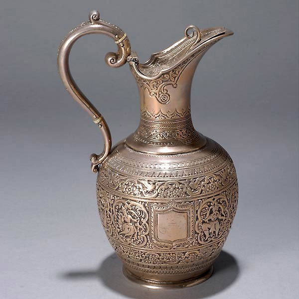 Victorian Sterling Ewer with Asian Repousse Design: Victorian Sterling Ewer with Asian Repousse Design, hall marked Glasgow, Sterling, 1886 by George Edwards & Sons {Total silver weight 10.82 troy oz; height 7 3/4 inches}