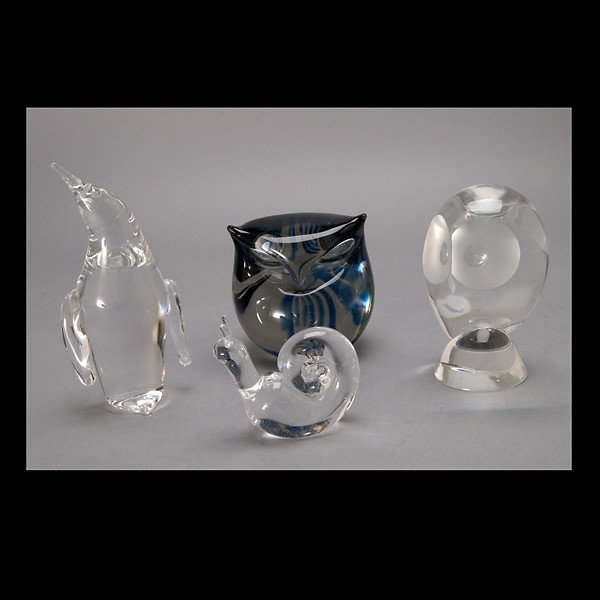 Three Glass Paperweight Animals by Steuben: Three Glass Paperweight Animals by Steuben: an owl; a penguin; and a snail; together with an unmarked owl (4) {Height of penguin 6 1/2 inches}