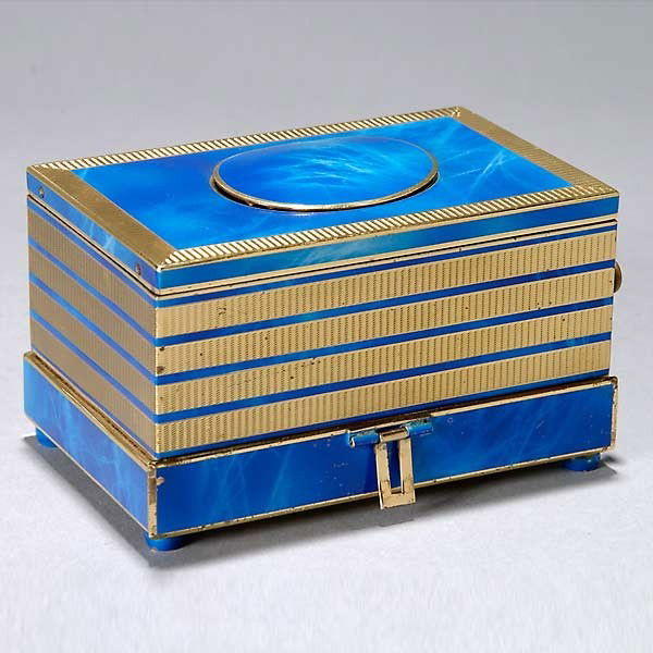 Swiss Blue Enameled Singing Bird Music Box: Swiss Blue Enameled Gilt Bronze Singing Bird Music Box The box form with alternating bands of blue enamel work and engine turned design, oval hinged door opening to reveal gilt grill with polychrome e
