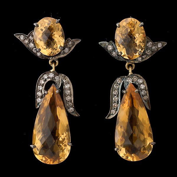 CITRINE, DIA., 14K Y/G, OXIDIZED, S. GILT EARRINGS: PAIR OF CITRINE, DIAMOND, 14K YELLOW GOLD, OXIDIZED, SILVER GILT EARRINGS. Each features one pear-cut and oval-cut citrine weighing a total of approximately 9.60 ct., accented by twenty full-cut diamo