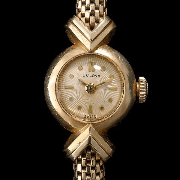 LADIES BULOVA 14K YELLOW GOLD WRIST WATCH.: LADIES BULOVA 14K YELLOW GOLD WRIST WATCH. Dial: Round, sun burst texture, gold tone, applied baton and dot hour markers, baton hands, Bulova. Movement: Seventeen jewels, unadjusted, Bulova Watch Co.