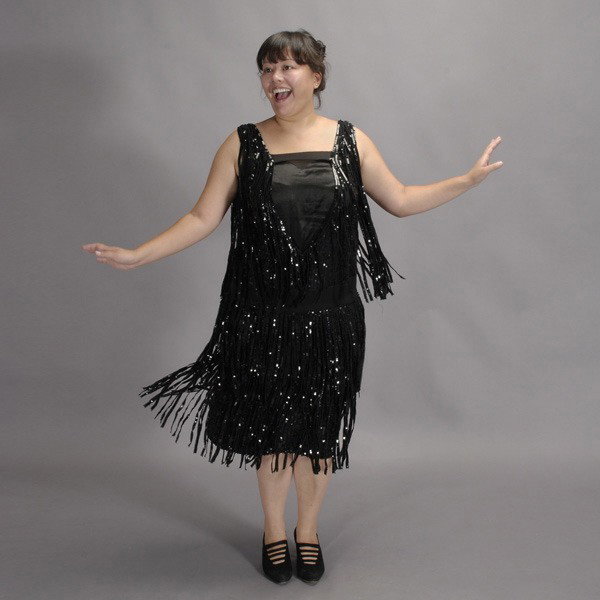 Vintage Fringed and Sequined Flapper Dress.: Vintage Fringed and Sequined Flapper Dress. Fully lined with black satin drop waist. Shoulder to mid waistband 22"; waist 40"; shoulder to hem 43"