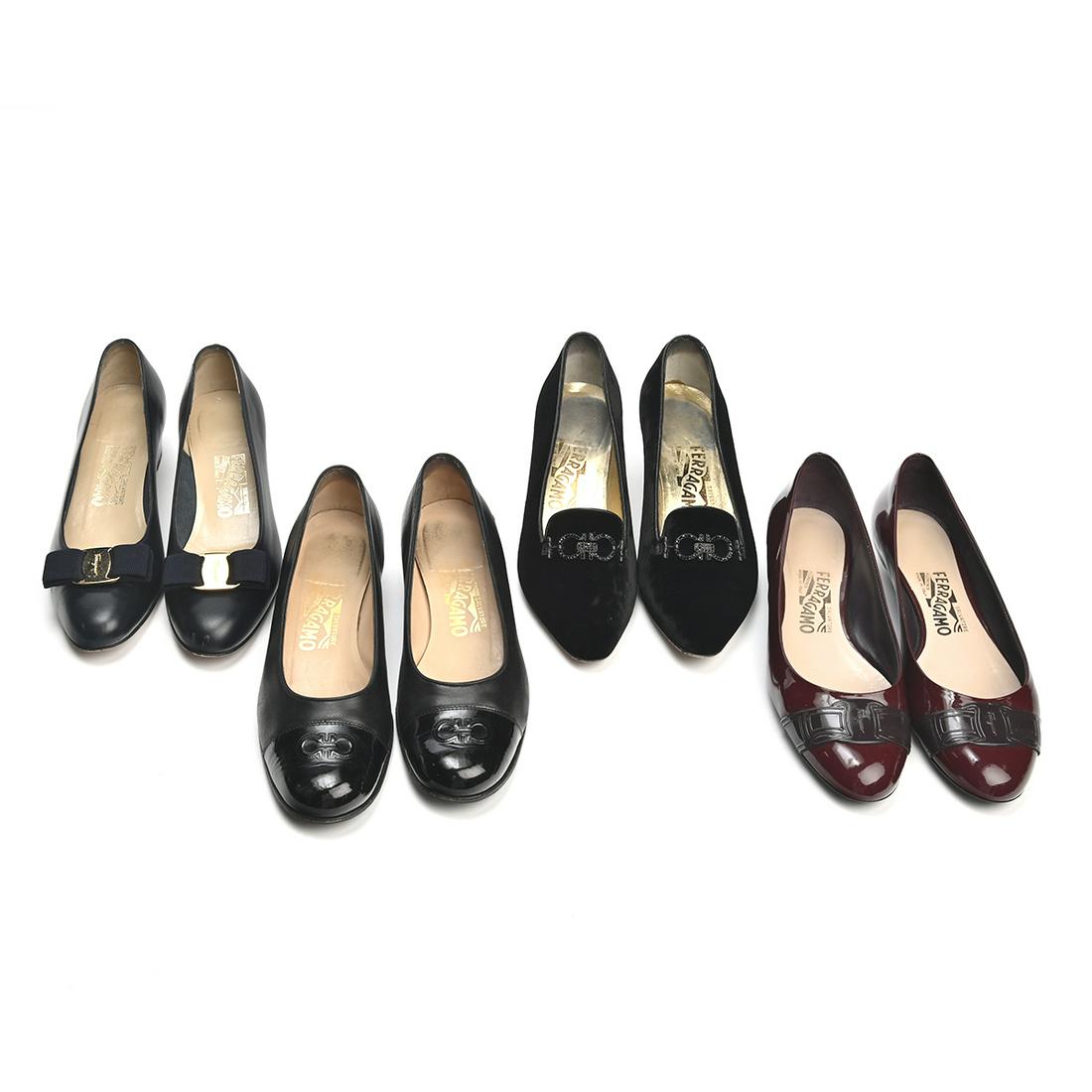Four Pairs of Ferragamo Shoes: Four Pairs of Ferragamo Shoes. Comprising black velvet loafer heels, dark blue leather loafer heels, black leather loafer heels, and red patent leather slightly raised loafers. Size 6.5 / 7 B Conditio