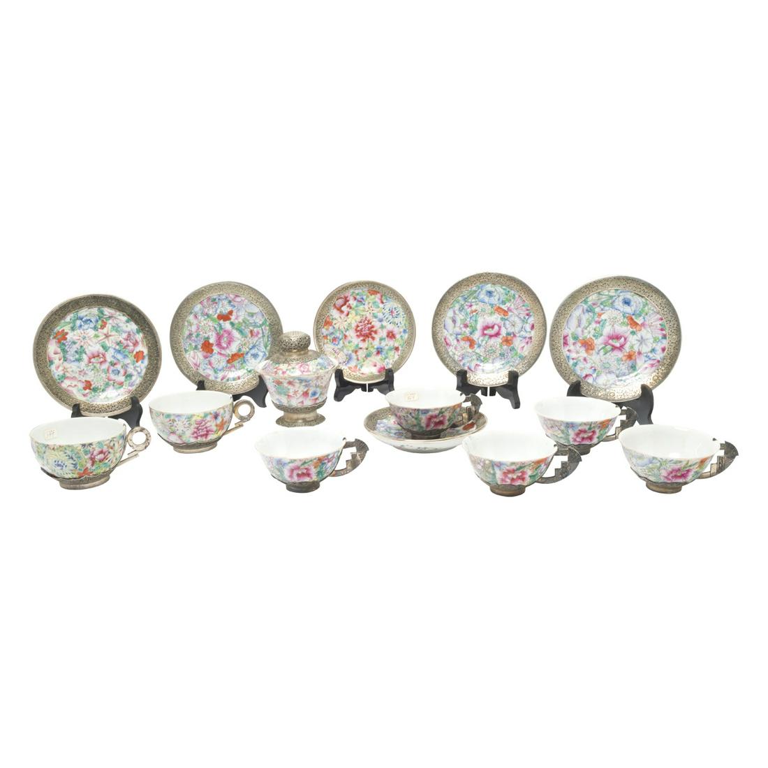 Set of Fourteen 'Millefleurs' Tea Bowls and Dishes: Set of Fourteen 'Millefleurs' Tea Bowls and Dishes. Comprising seven bowls, a teacup with cover, and six dishes, all painted on the exterior with rich famille rose, iron-red with dense flowers, the ba