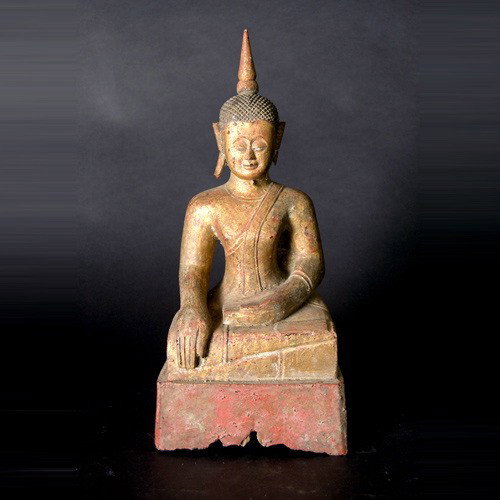 SOUTHEAST ASIA a lacquer and gilt painted Buddha: SOUTHEAST ASIA a lacquer and gilt painted wood figure of a seated Buddha. Height 14 1/2 inches. Sale to benefit the programs of Folk Art International Resources for Education, a nonprofit charitable o
