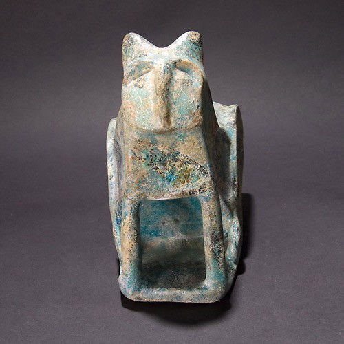 Iran Iranian ceramic art cat: IRAN ceramic cat with metallic glaze and remains of black paint. Length 9 inches. In very good,intact condition. Sale to benefit the programs of Folk Art International Resources for Education, a nonpr