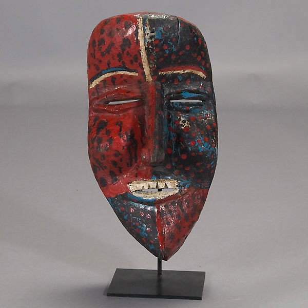 Woyo mask congo Kongo African art: WOYO mask. Wood with red, blue, white and black paints. Height 19 inches. In good condition, vertical cracks on left side.