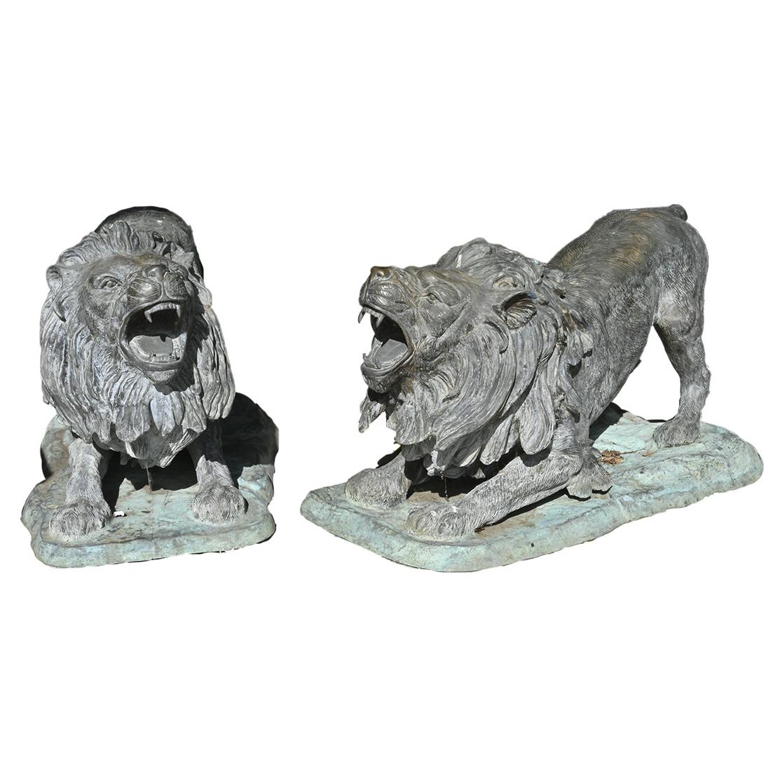 Pair of Large Patinated Bronze Crouching Lions (1 of 3)