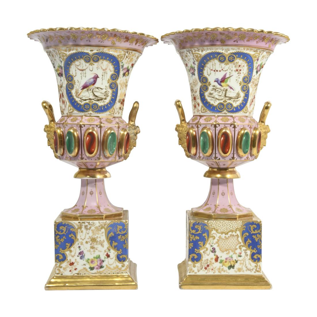 Pair of Jacob Petit Pink Ground Porcelain Vases.: Pair of Jacob Petit Pink Ground Porcelain Vases. Pinked edges flaring over panelled sides, the white grounds extensively parcel and raised paste gilt decofate, surrounding blue enamel scrolls reservin