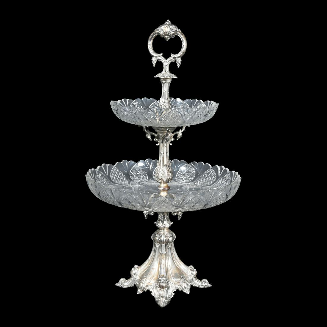 Victorian Silverplate and Cut Glass Epergne.: Victorian Silverplate and Cut Glass Epergne. Manner of Elkington. Rococo revival with grapemotifs pendant from two tier silverplate handle, standard and quadruple scroll squared base, with two scallop