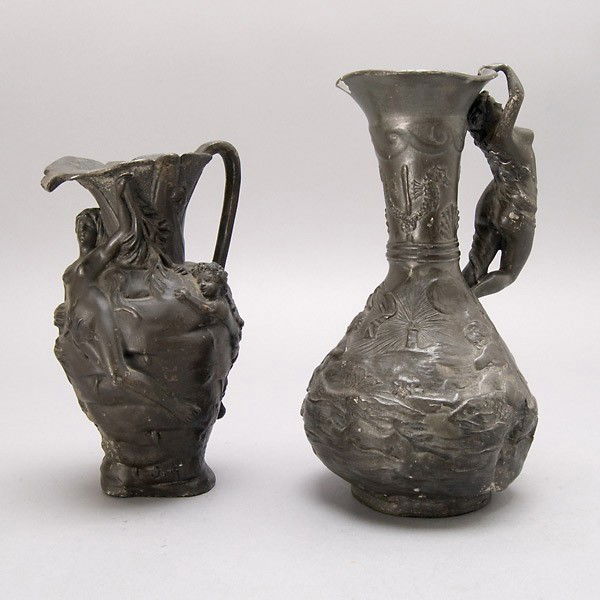 Two Art Nouveau Pewter Ewers: Two Art Nouveau Pewter Ewers, one stamped "J. Garnier; another stamped "Paris" {Height of taller 9 inches} [One in poor condition]
