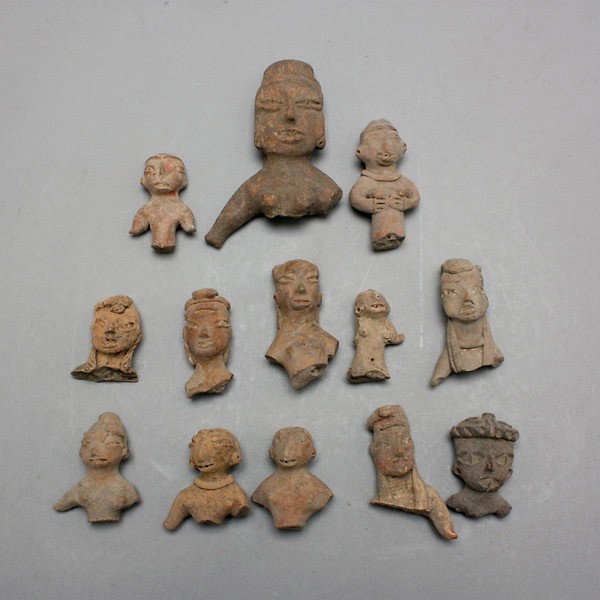 13 tlatilco heads, miniature figure fragments: Thirteen TLATILCO heads (miniature figure fragments). Circa 800-300 B.C. Solid ceramic. Height of largest 3 3/4 inches. Provenance: the estates of Douglas Hague and Jorge Euan, San Francisco, CA. Coll