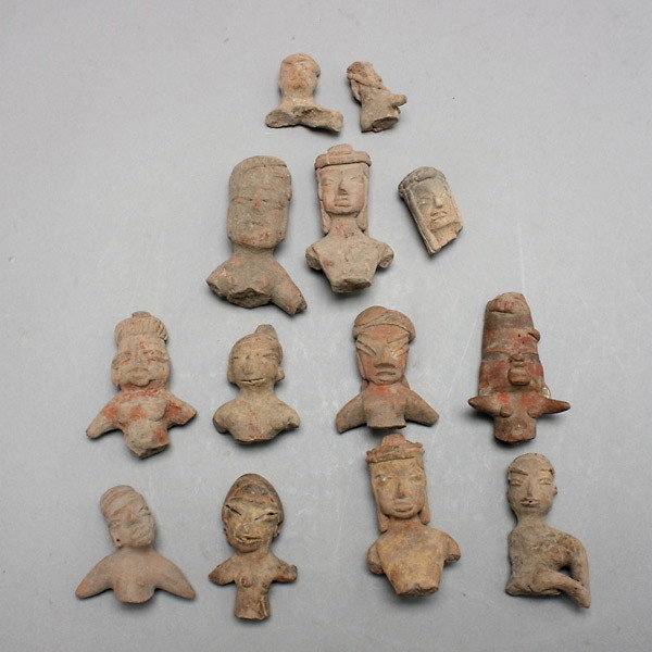 13 tlatilco heads, miniature figure fragments: Thirteen TLATILCO heads (miniature figure fragments). Circa 800-300 B.C. Solid ceramic. Height of largest 2 3/4 inches. {Lenght of longest 2 3/4 inches} Provenance: the estates of Douglas Hague and Jo