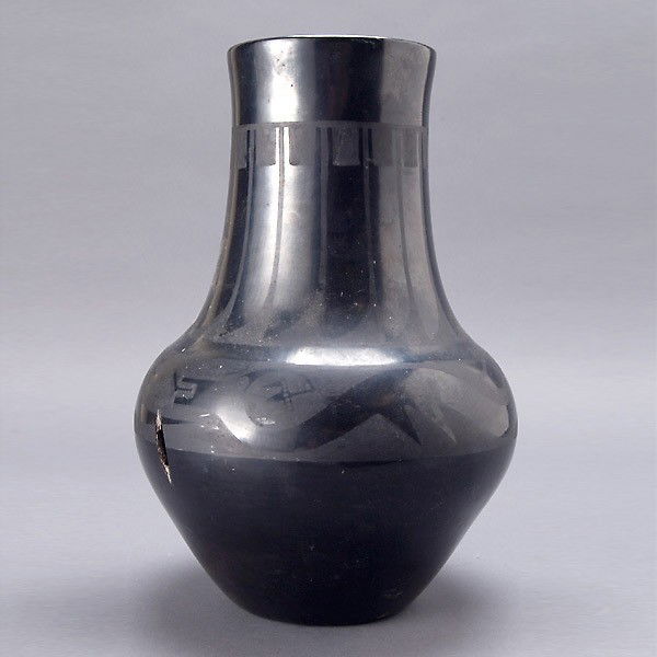 MARIE AND JULIAN San Ildefonso vase.: MARIE AND JULIAN San Ildefonso vase. 13 1/2 x 9 inches. Damaged, hole on one side.