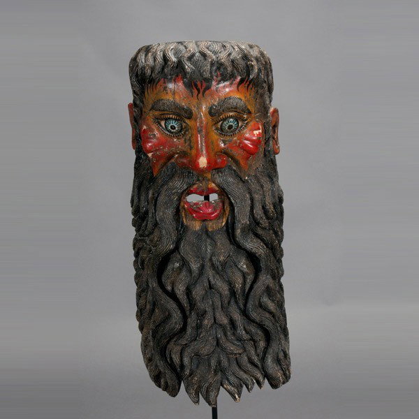 large mexican helmet mask: Large MEXICAN helmet mask. Painted wood. Height 29 1/2 inches. With a stand. Provenance: the estates of Douglas Hague and Jorge Euan, San Francisco, CA. Collected in the 1960's.