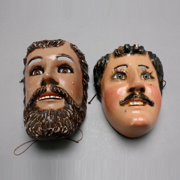 2 mexican masks. painted wood w/glass eyes: Two MEXICAN masks. Painted wood with glass eyes and false eyelashes, gold or silver foil on teeth. One with eyelids that close with a pull string. Height of one 9 inches. Both in very good condition, 