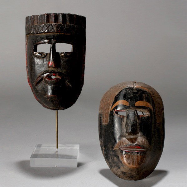2 masks, mexico and guatemalan: Two masks, MEXICO AND GUATEMALA. Painted wood, mostly black. One on a stand. Height of one 7 1/ inches. Both in good condition. Provenance: the estates of Douglas Hague Jorge Euan, San Francisco, CA. 