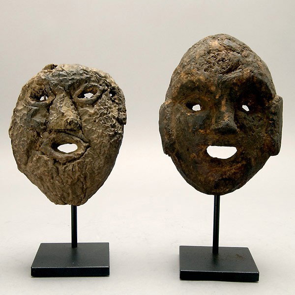 Two tree fungus masks, Nepal. : Two tree fungus masks, Nepal. Height 6 1/4 inches. On stands.